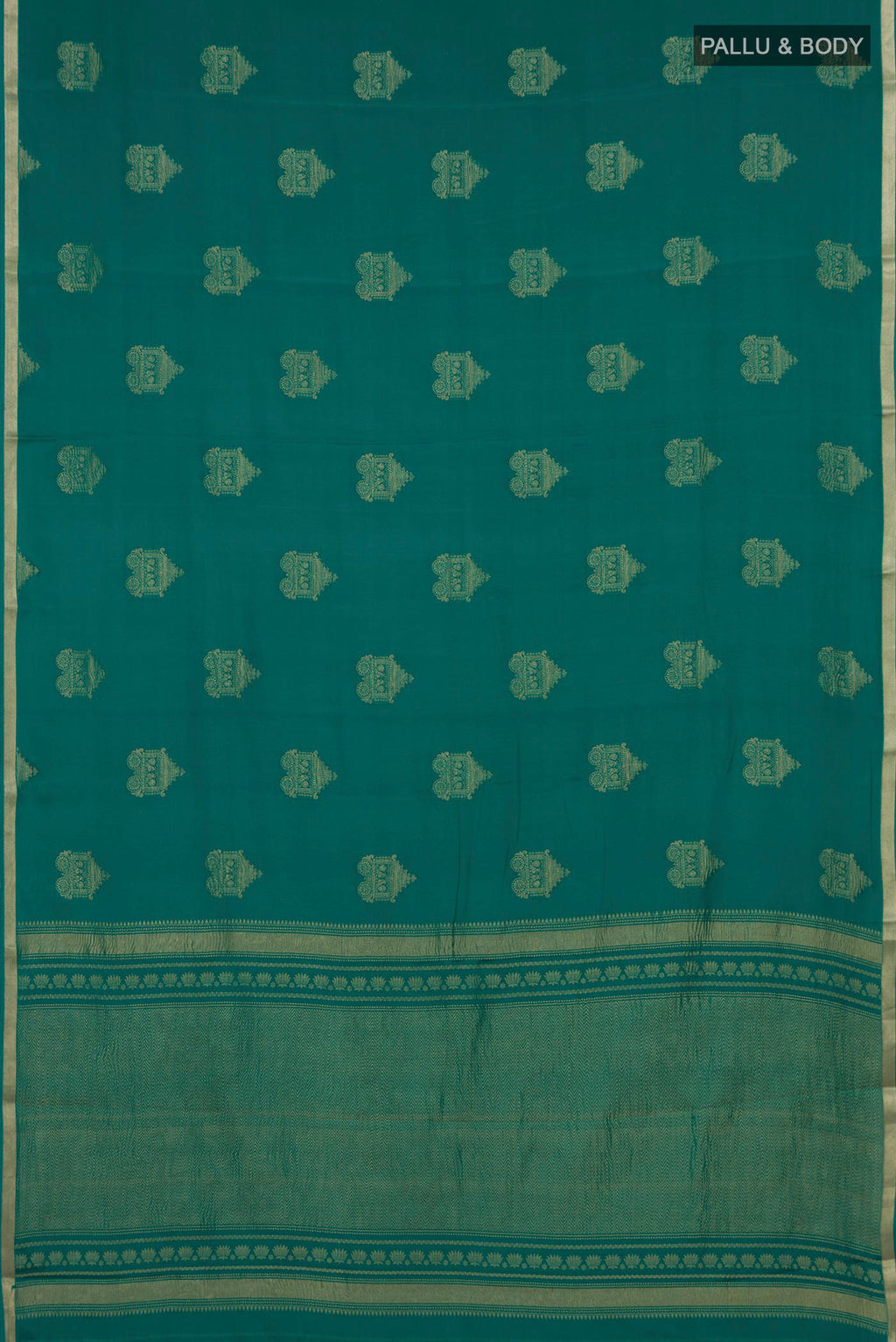 Flat view of Teal Mysore Crepe Saree with Zari Butta on the body and Thin Zari Line. 