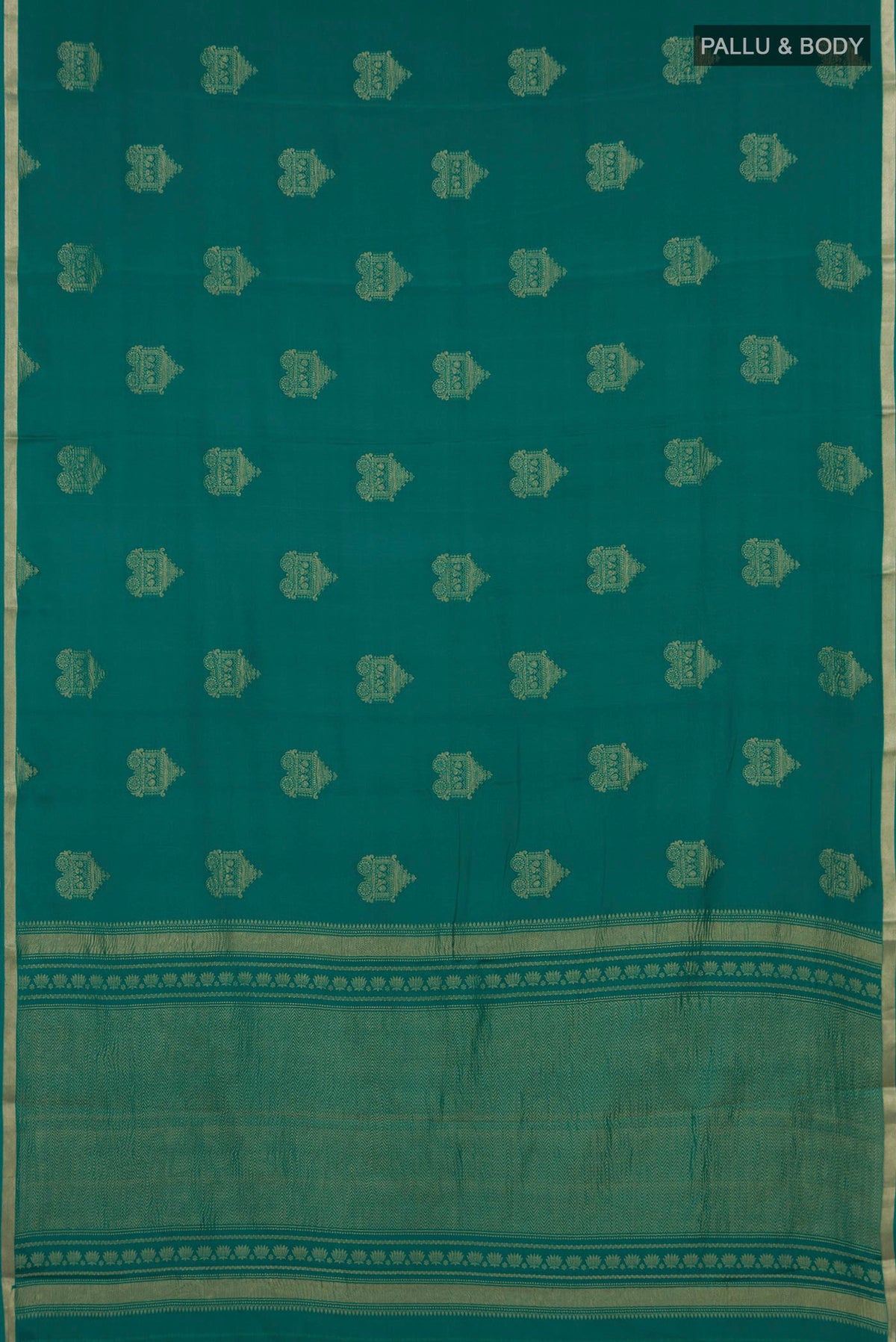 Flat view of Teal Mysore Crepe Saree with Zari Butta on the body and Thin Zari Line. 