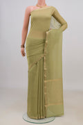 Light Green Mysore Georgette Saree with Stripes on the body and Thin Zari Line.  displayed on a mannequin