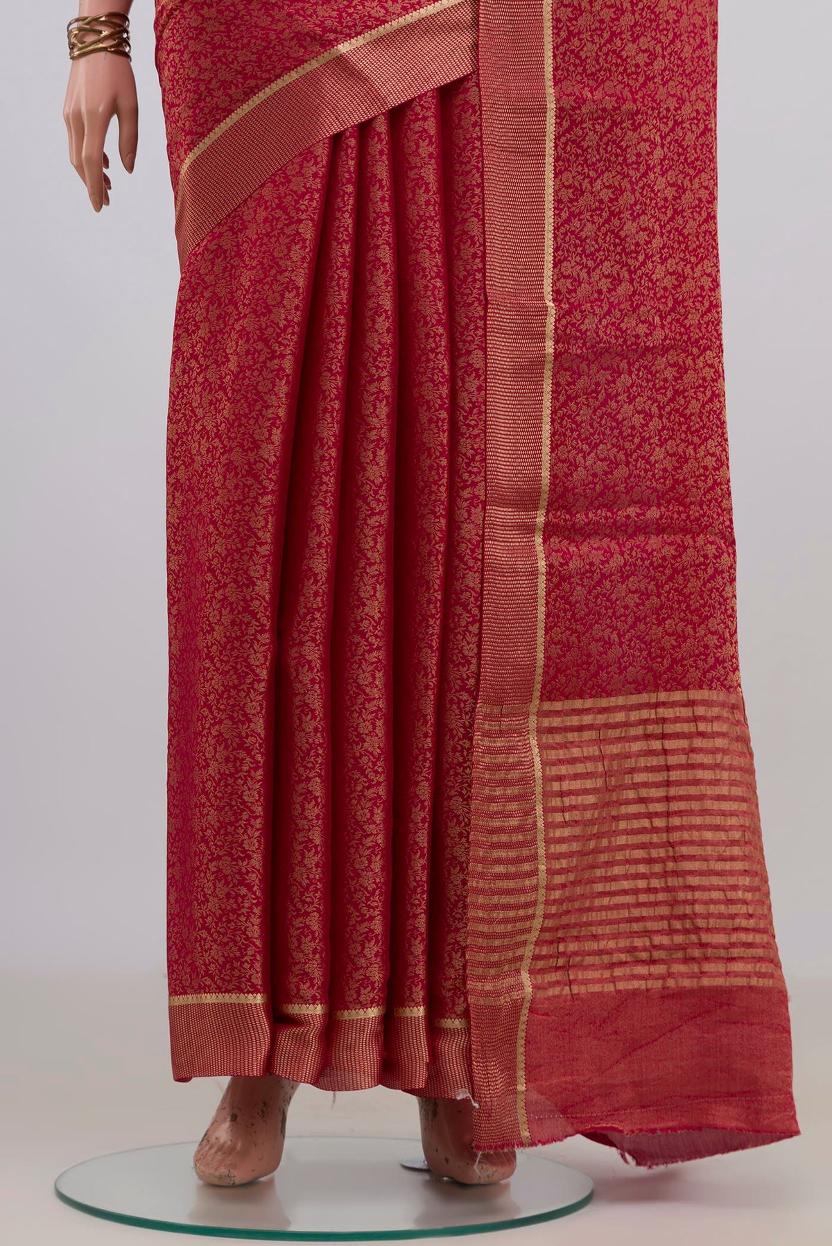 Pleats and pallu of Dark Pink Mysore Crepe Saree with Zari Brocade on the body and Zari Border. 