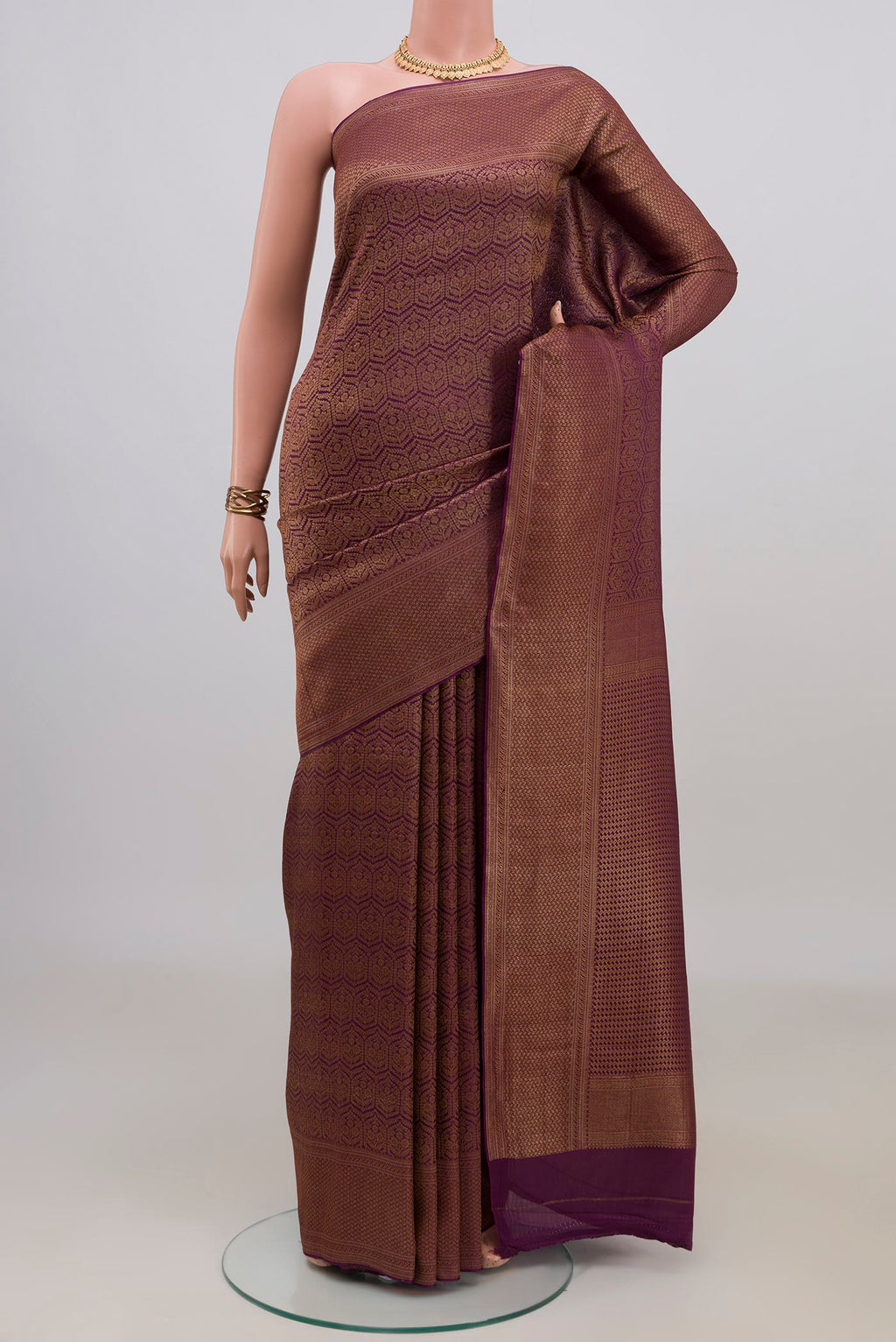 Purple Mysore Crepe Saree with Zari Brocade on the body and Zari Border.  displayed on a mannequin
