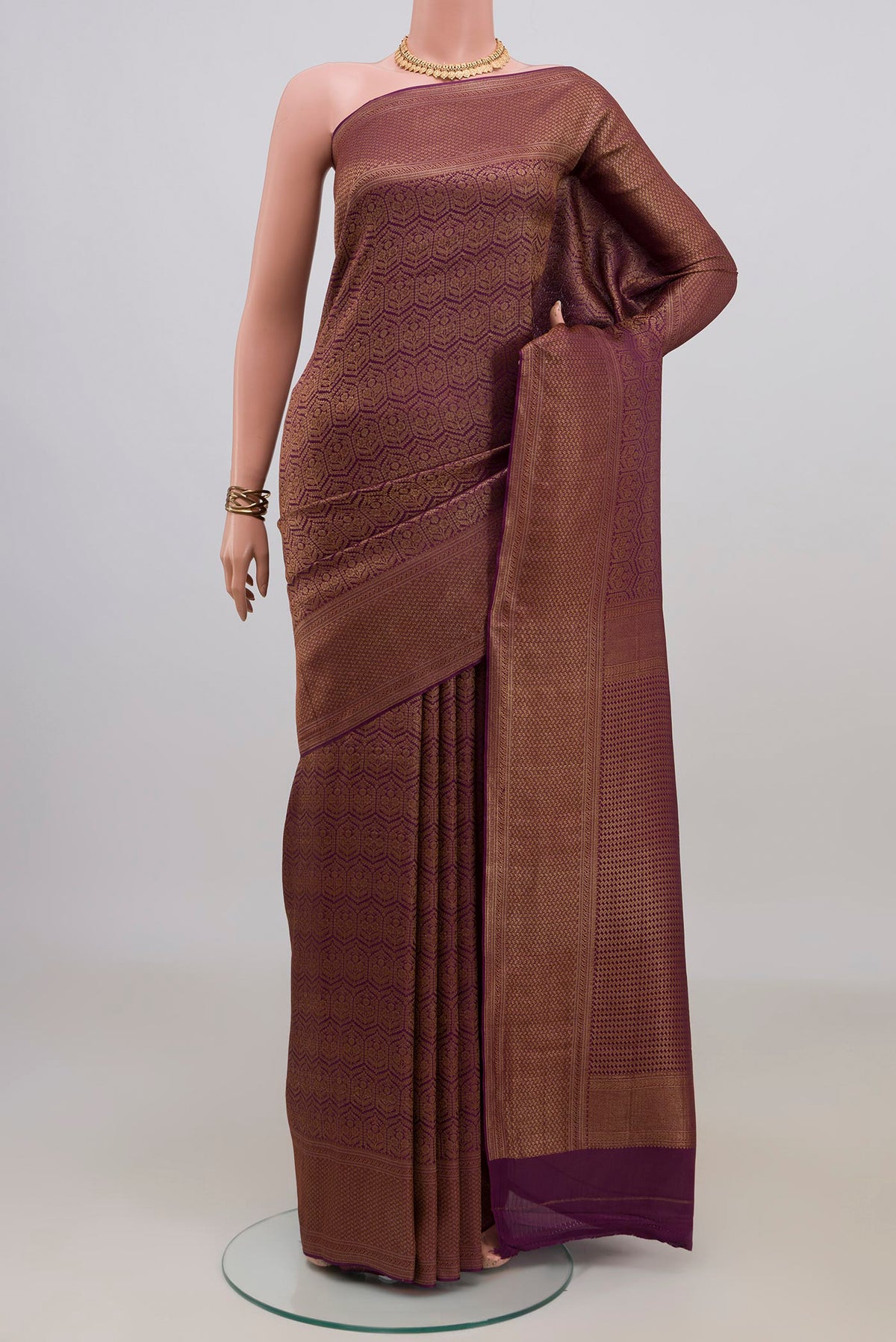 Purple Mysore Crepe Saree with Zari Brocade on the body and Zari Border.  displayed on a mannequin