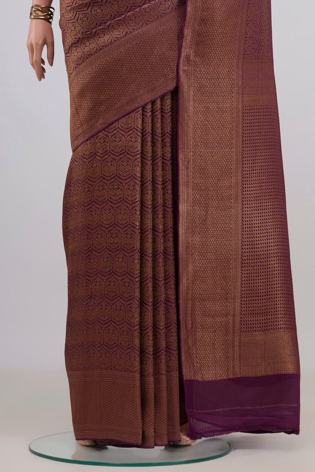 Pleats and pallu of Purple Mysore Crepe Saree with Zari Brocade on the body and Zari Border. 