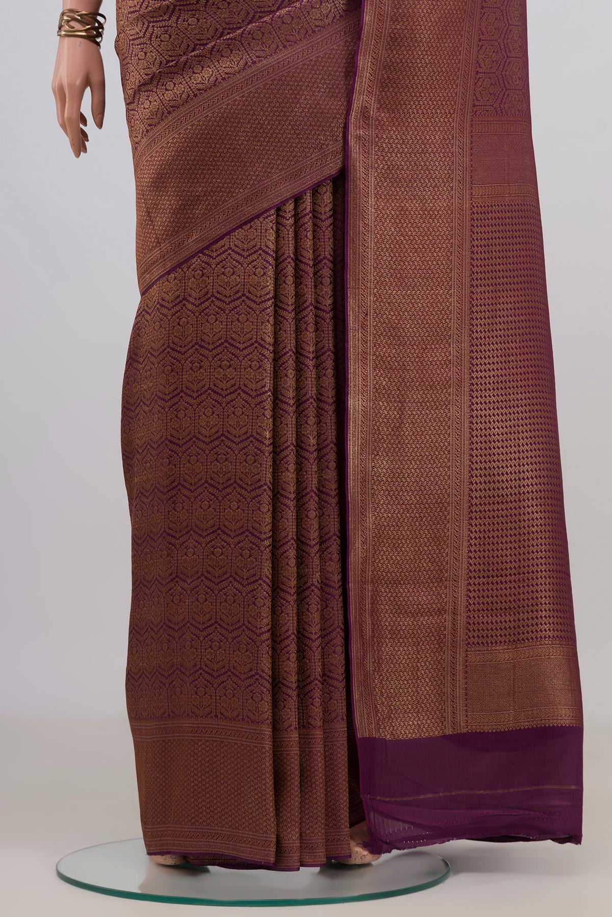 Pleats and pallu of Purple Mysore Crepe Saree with Zari Brocade on the body and Zari Border. 
