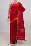 Pure Silk Pure Zari Red Kanchipuram Saree with Checked design on the body and Zari Border.  displayed on a mannequin