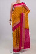 Pure Silk Mustard Pochampally Saree with Pure Ikat on the body and Zari Border.  displayed on a mannequin
