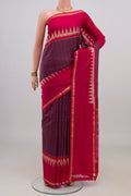Purple Pochampally Silk Saree with Ikat design on the body and Thin Zari Line.  displayed on a mannequin