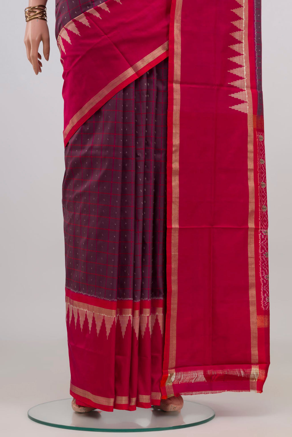 Pleats and pallu of Purple Pochampally Silk Saree with Ikat design on the body and Thin Zari Line. 