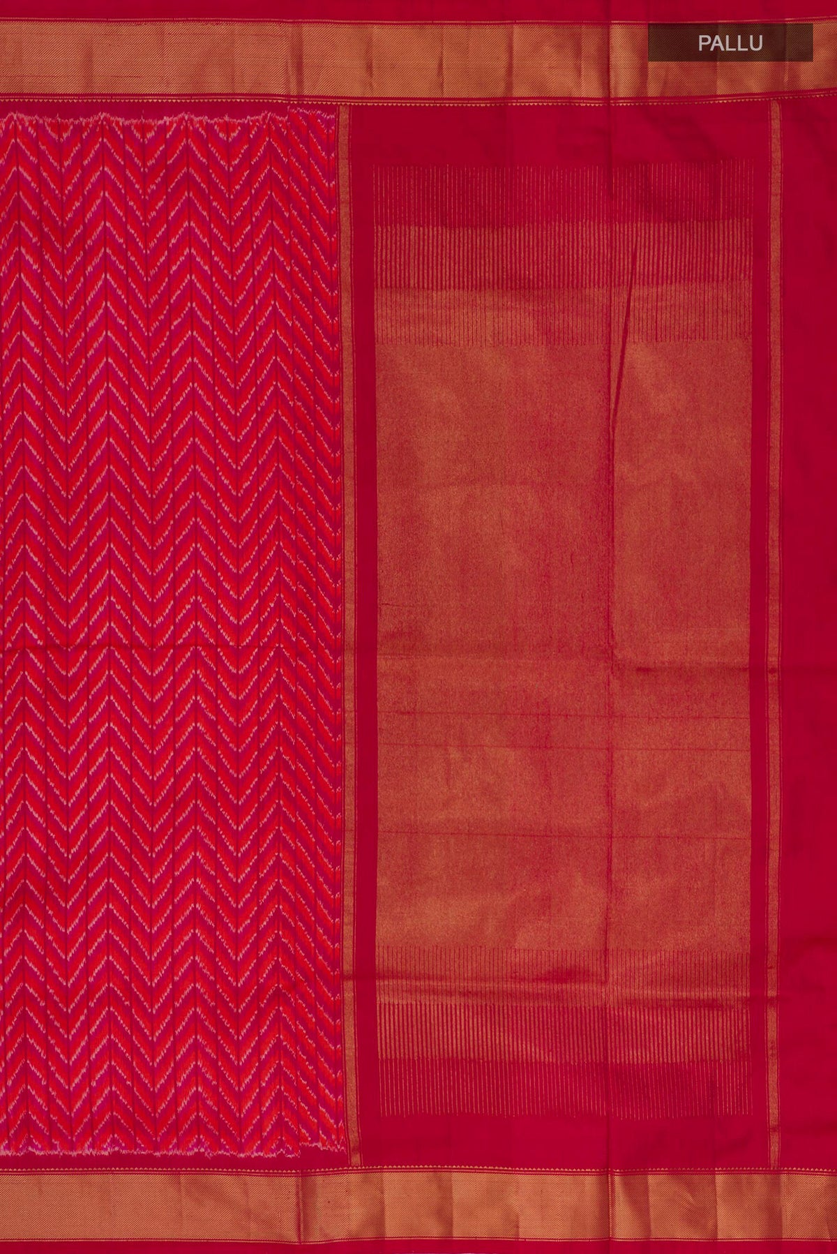 Close up image of the pallu of Pink Pochampally Silk Saree with Ikat design on the body and Zari Border. 