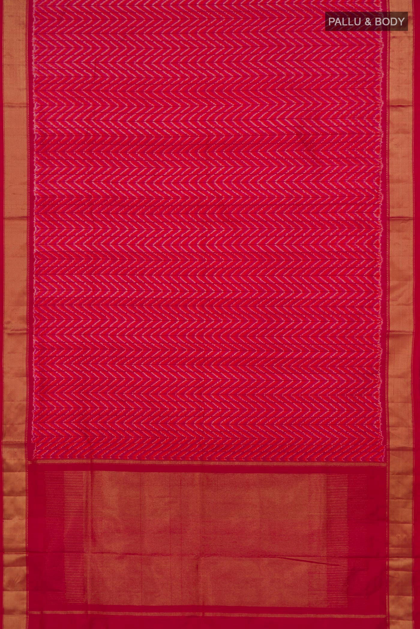 Flat view of Pink Pochampally Silk Saree with Ikat design on the body and Zari Border. 