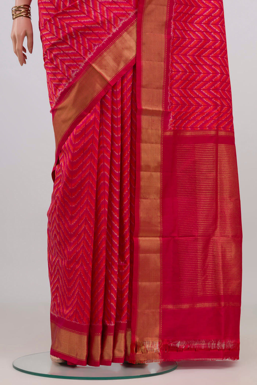 Pleats and pallu of Pink Pochampally Silk Saree with Ikat design on the body and Zari Border. 