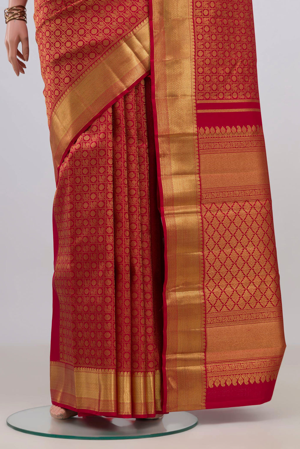 Pleats and pallu of Pure Silk Pure Zari Red Kanjivaram Saree with Zari Brocade on the body and Zari Border. 