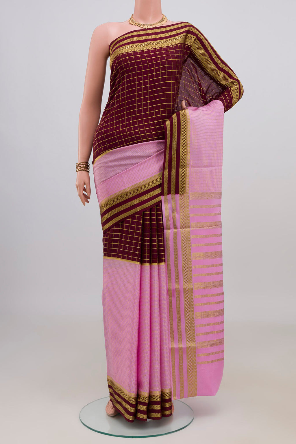Multi Color Mysore Crepe Saree with Half And Half on the body and Zari Border.  displayed on a mannequin