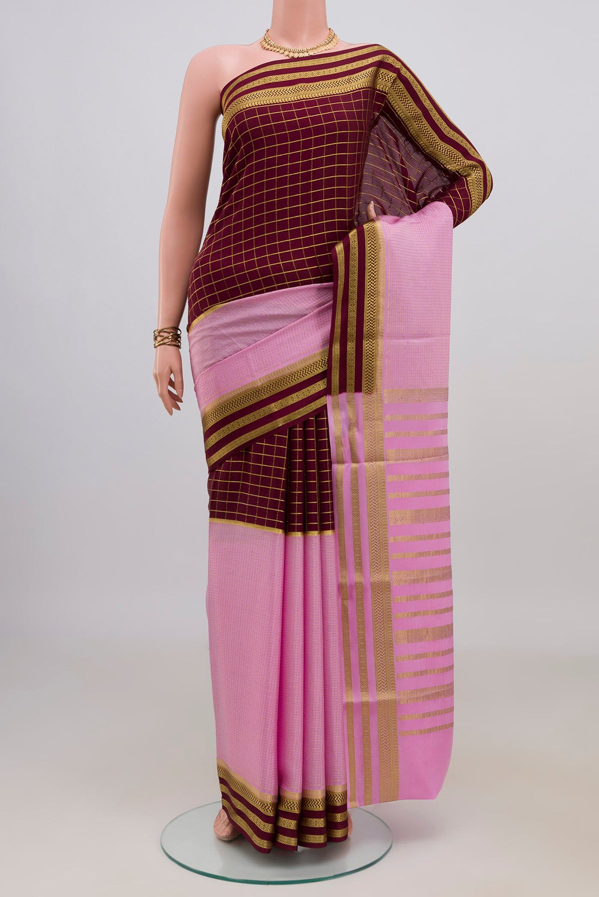 Multi Color Mysore Crepe Saree with Half And Half on the body and Zari Border.  displayed on a mannequin