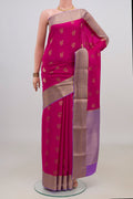 Pink Mysore Crepe Saree with Zari Butta on the body and Zari Border.  displayed on a mannequin