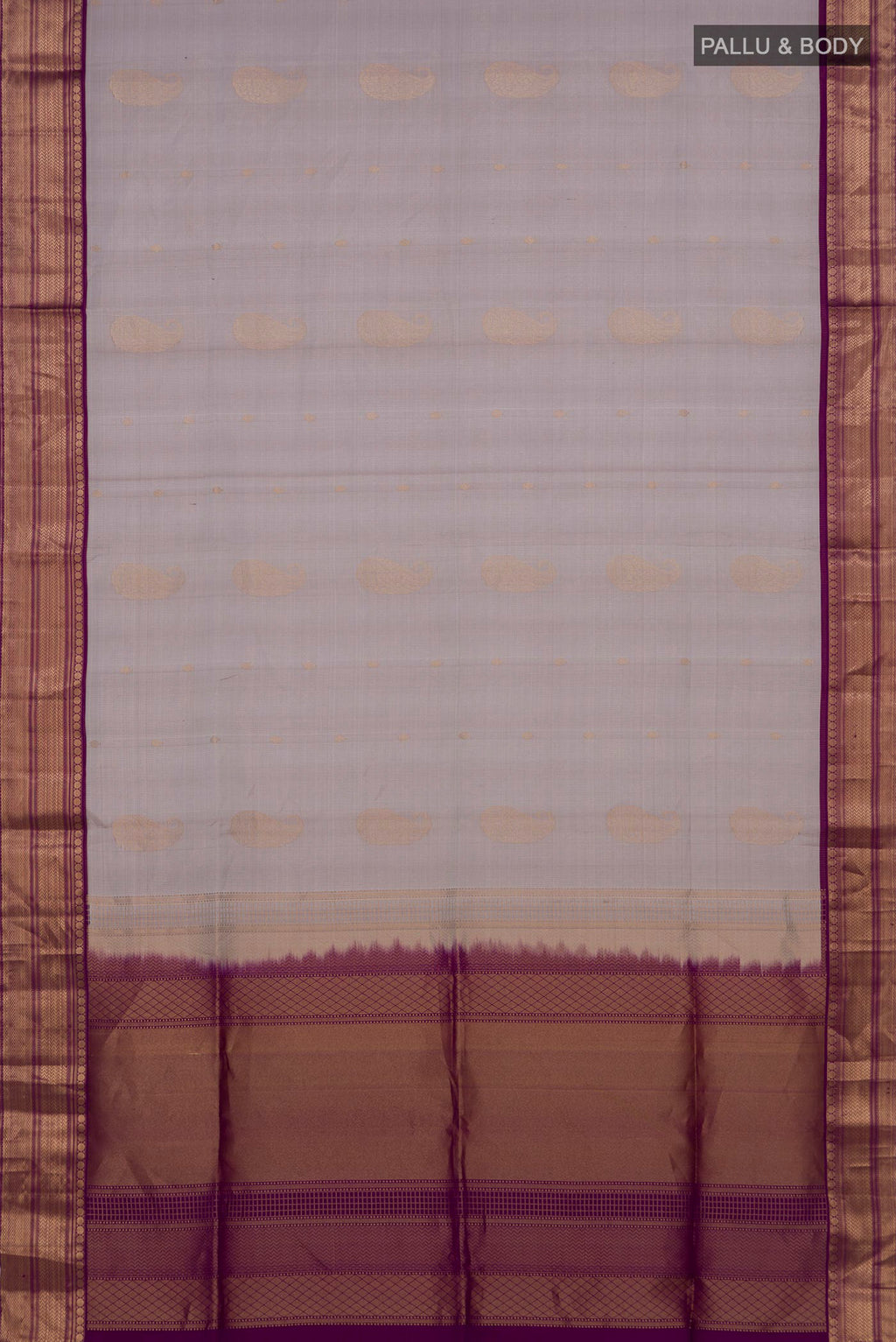 Flat view of Pure Silk Grey Soft Saree with Zari Butta on the body and Zari Border. 