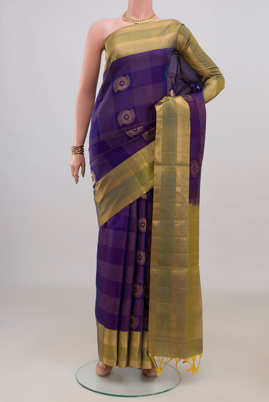 Pure Silk Blue Soft Saree with Checked design on the body and Zari Border.  displayed on a mannequin