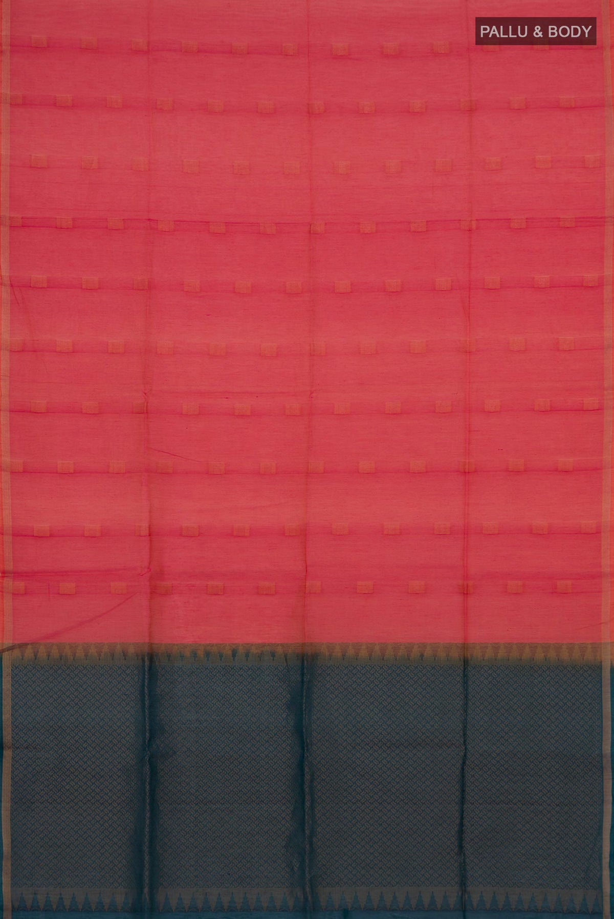Flat view of Coral Silk Cotton Saree with Zari Butta on the body and Thin Zari Line. 