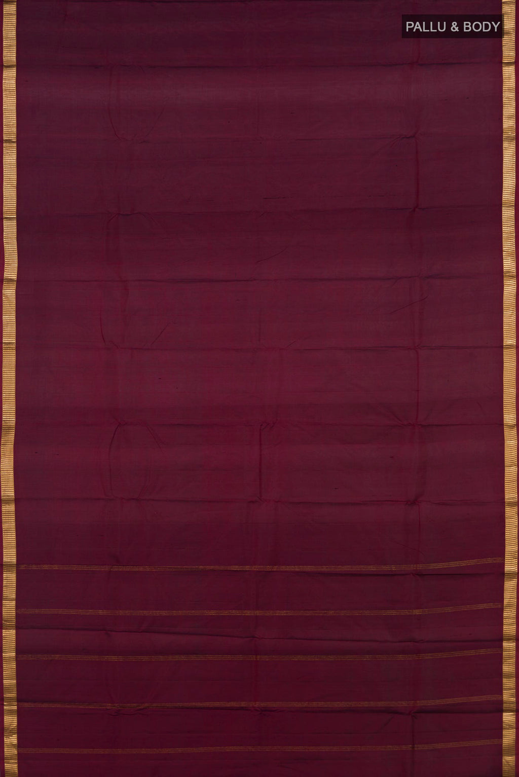 Flat view of Pure Silk Maroon Kanjivaram Saree with Plain Body and Zari Border. 