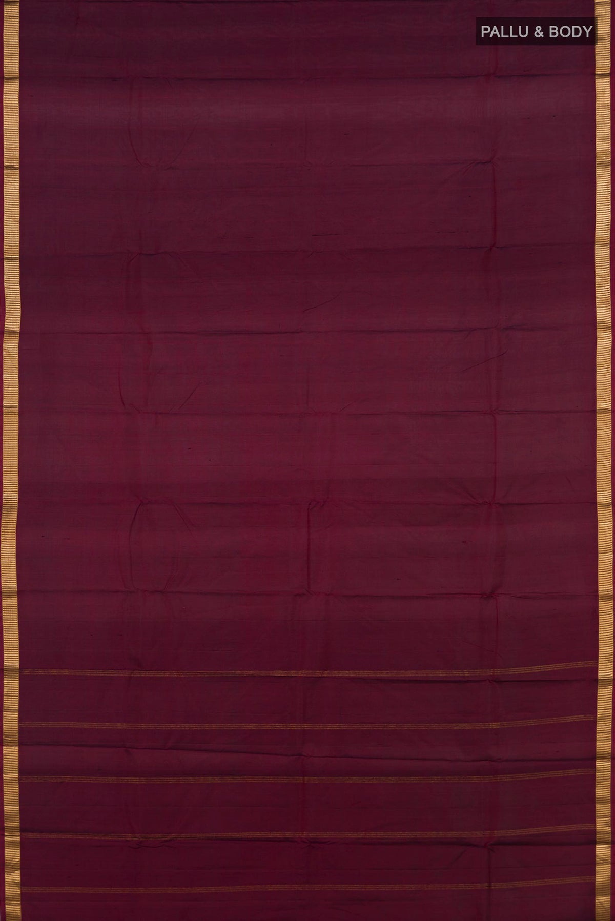 Flat view of Pure Silk Maroon Kanjivaram Saree with Plain Body and Zari Border. 