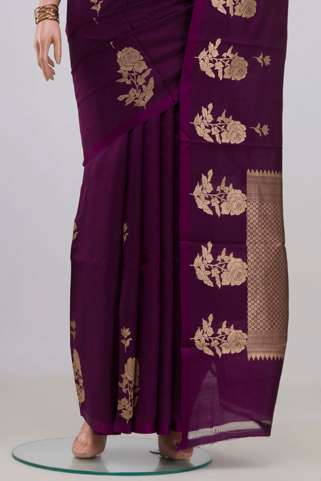 Pleats and pallu of Pure Silk Purple Banarasi Katan Saree with Zari Butta on the body and Without Border. 