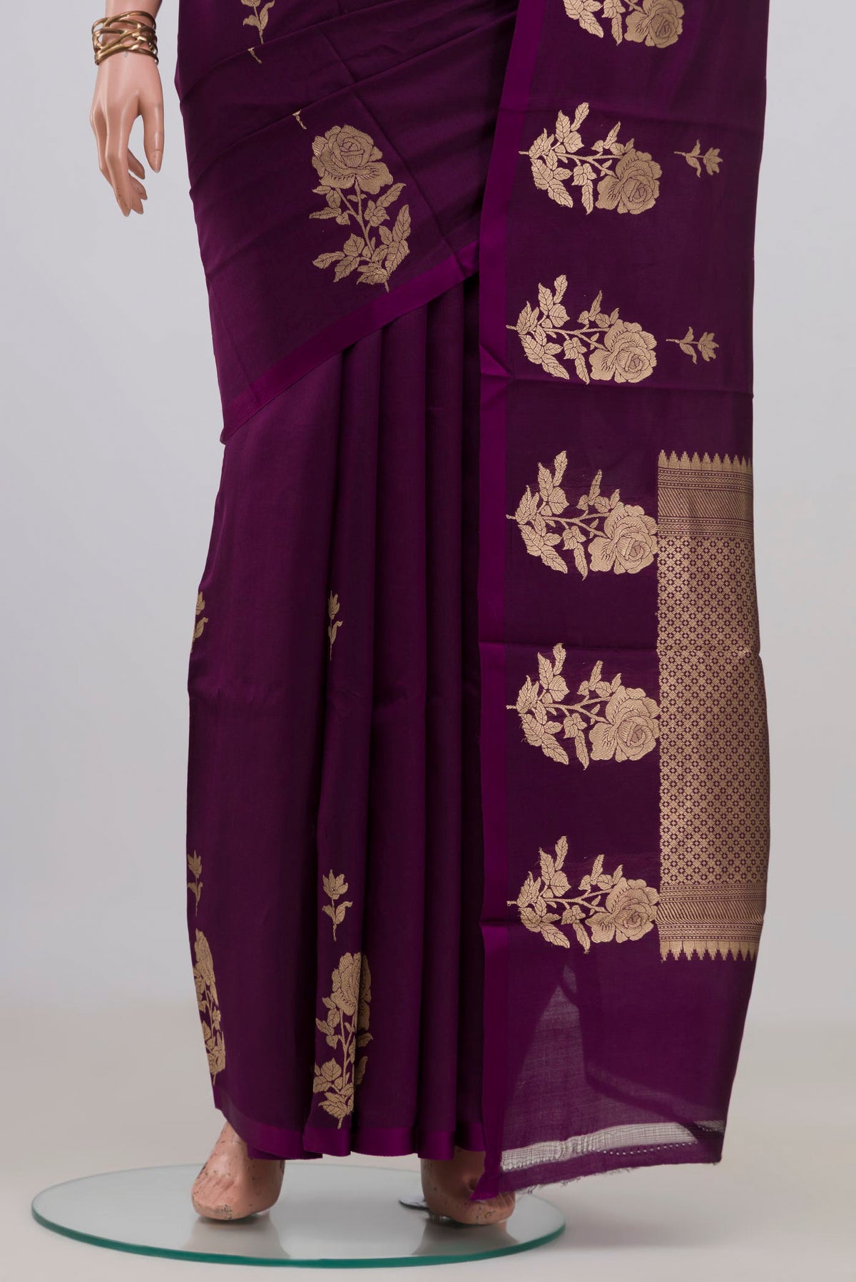 Pleats and pallu of Pure Silk Purple Banarasi Katan Saree with Zari Butta on the body and Without Border. 