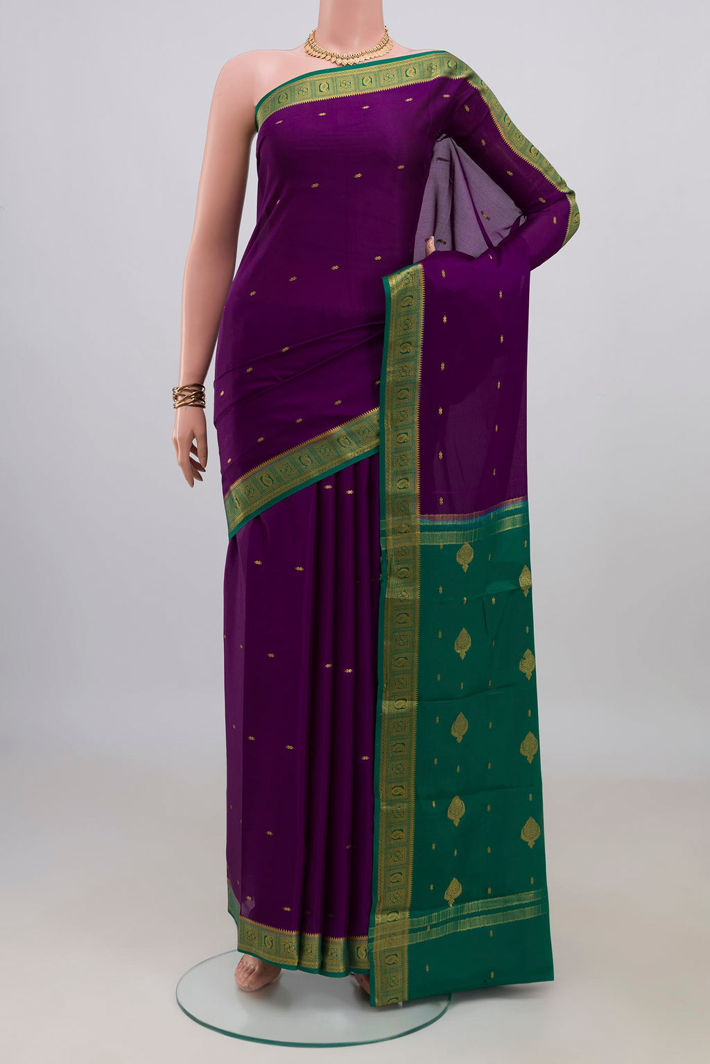 Purple Mysore Crepe Saree with Zari Butta on the body and Zari Border.  displayed on a mannequin