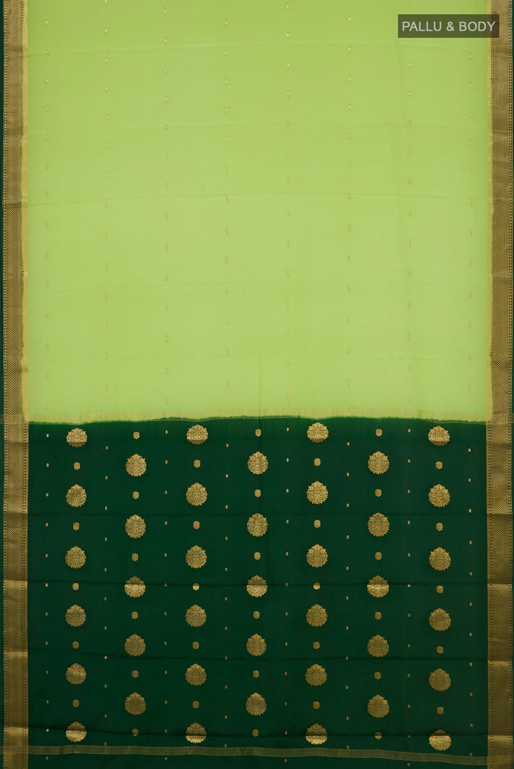 Flat view of Light Green Mysore Crepe Saree with Zari Butta on the body and Zari Border. 