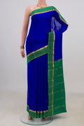 Royal Blue Mysore Crepe Saree with Plain Body and Zari Border.  displayed on a mannequin