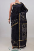 Pure Silk Navy Blue Pochampally Saree with Pure Ikat on the body and Zari Border.  displayed on a mannequin