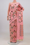 Pure Silk Peach Pochampally Saree with Pure Ikat on the body and Plain Border.  displayed on a mannequin