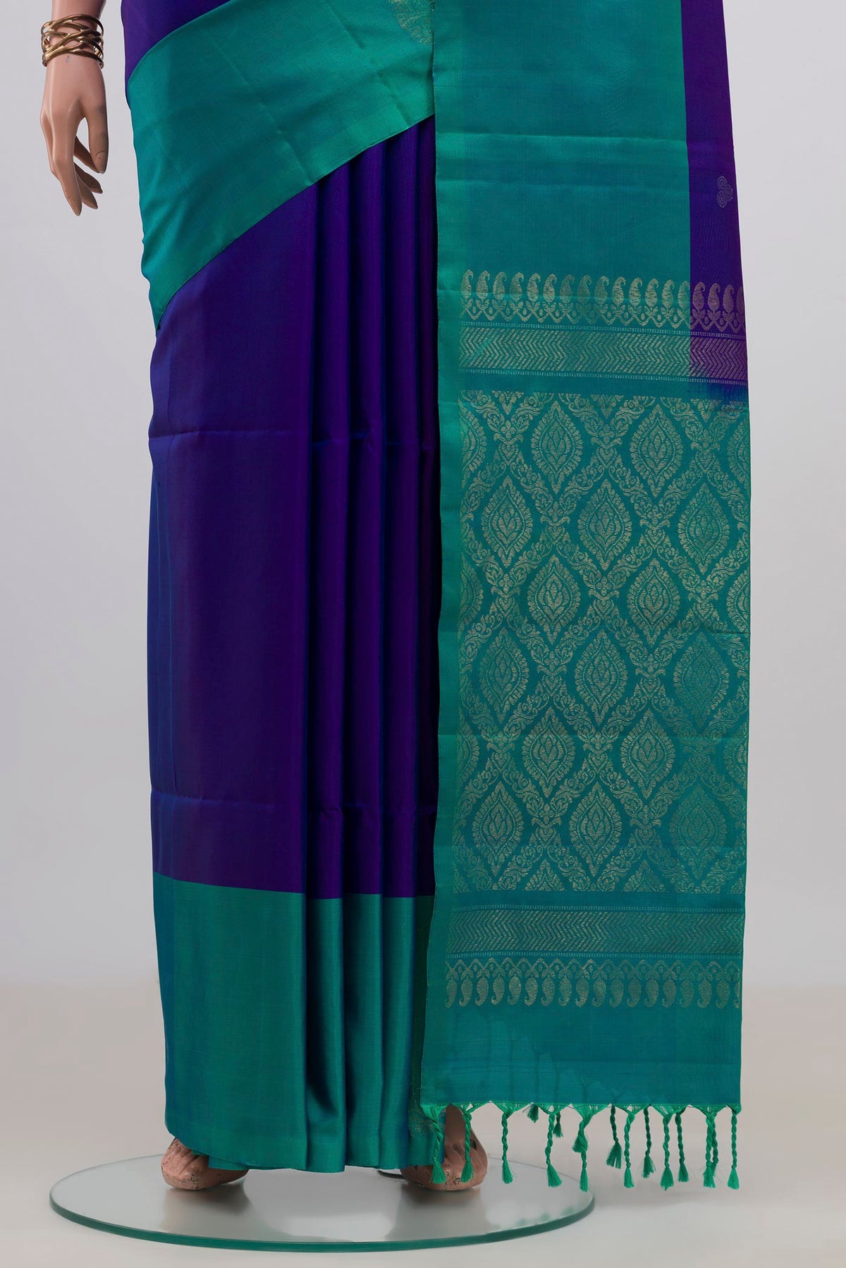 Pleats and pallu of Pure Silk Blue Soft Saree with Zari Butta on the body and Fancy Border. 