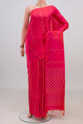 Pure Silk Pink Soft Saree with Zari Butta on the body and Without Border.  displayed on a mannequin