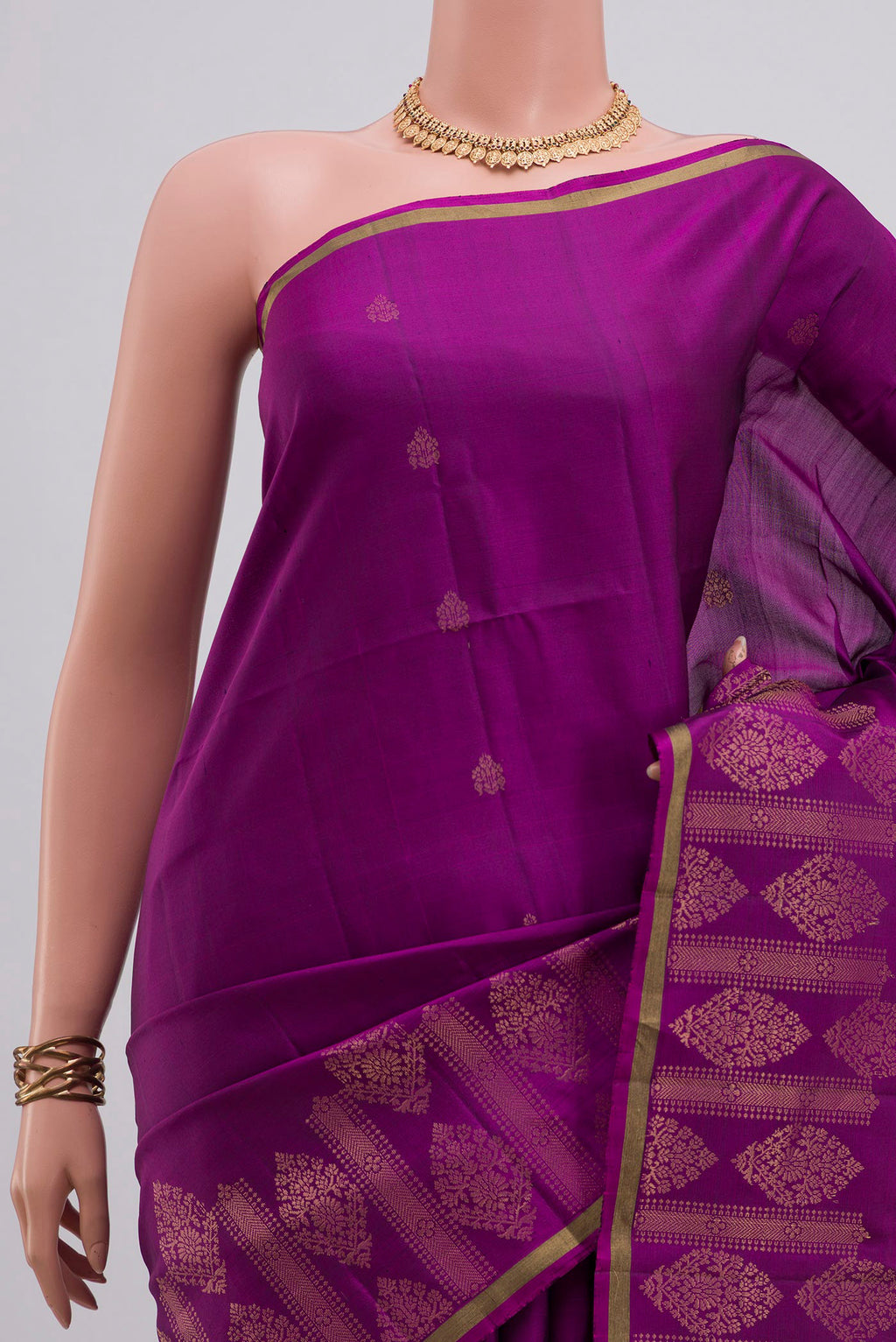 Border image of Pure Silk Purple Soft Saree with Zari Butta on the body and Thin Zari Line. 