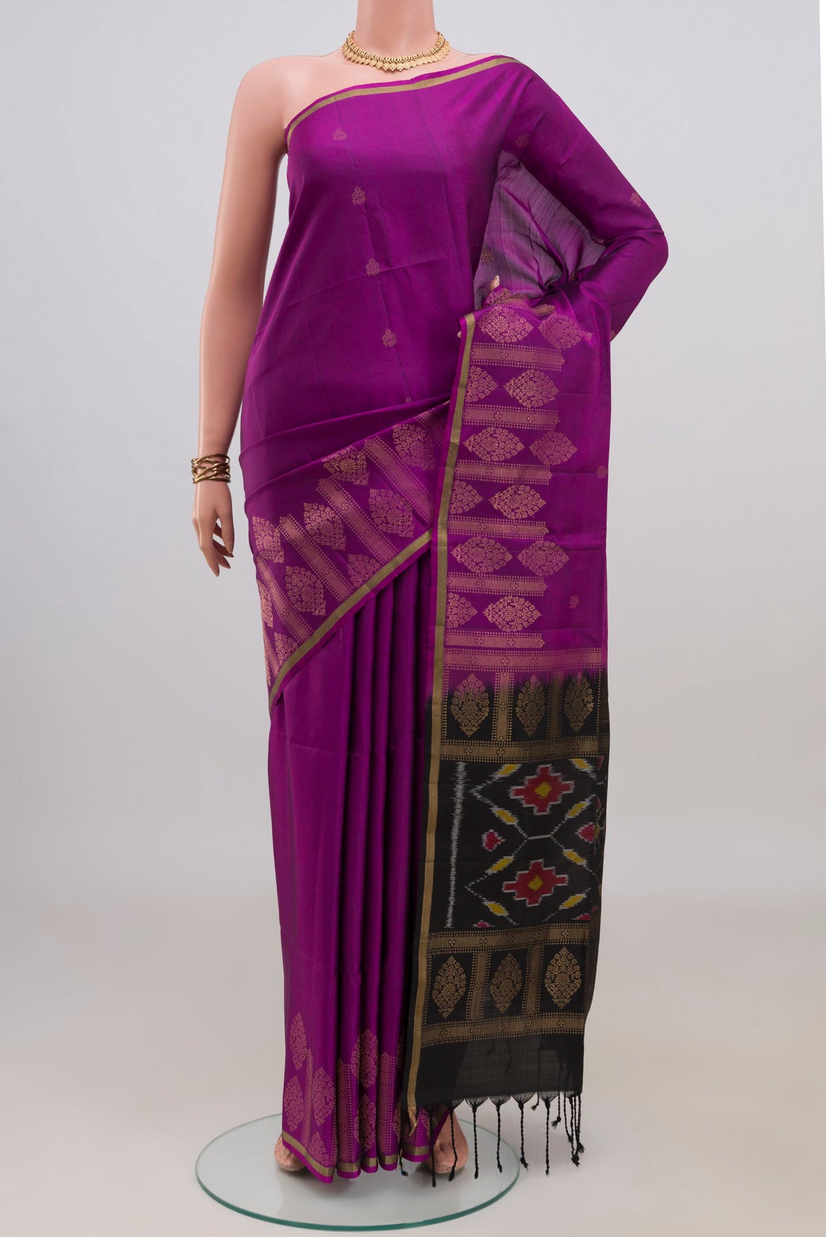 Pure Silk Purple Soft Saree with Zari Butta on the body and Thin Zari Line.  displayed on a mannequin