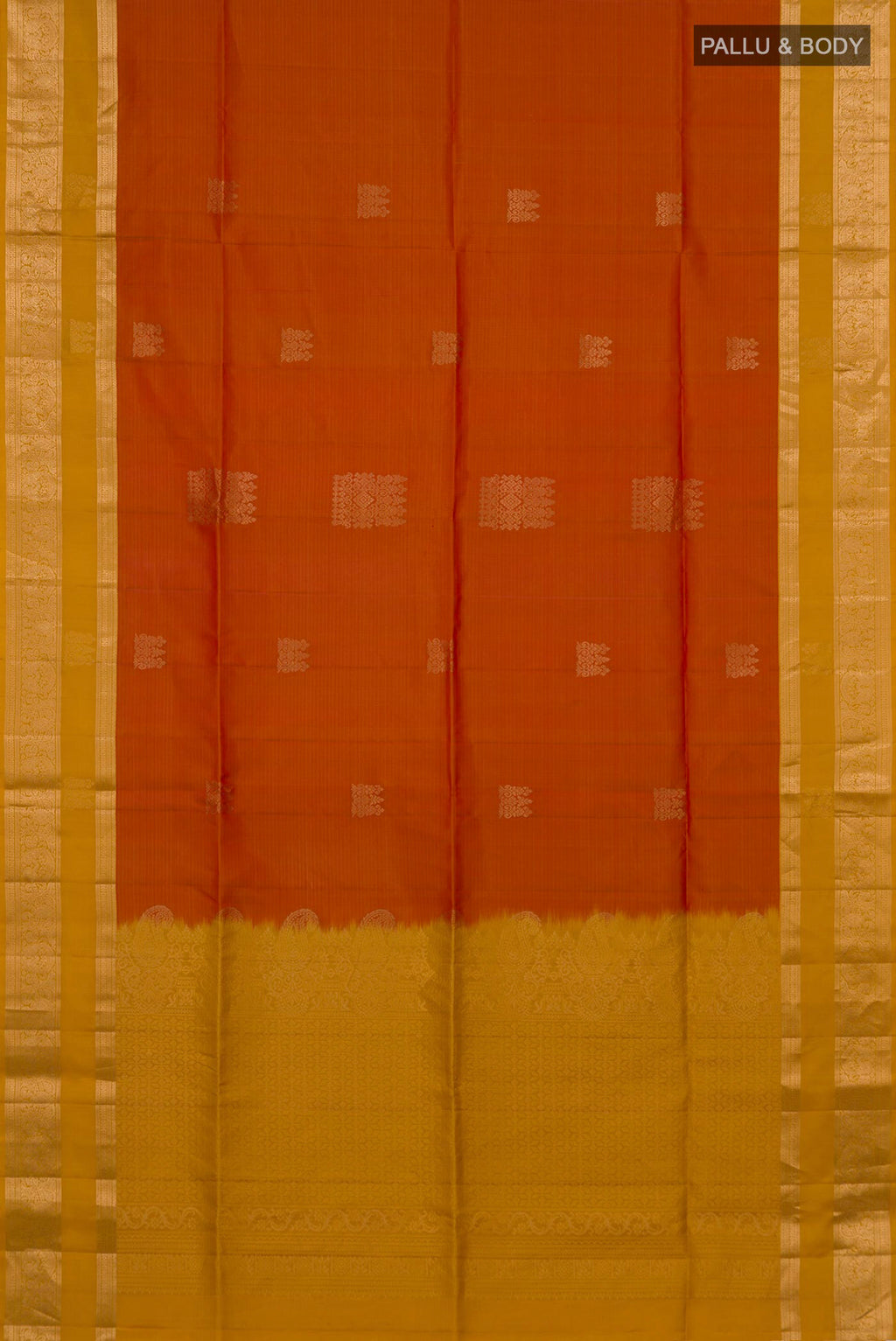 Flat view of Pure Silk Brick Orange Soft Saree with Zari Butta on the body and Zari Border. 