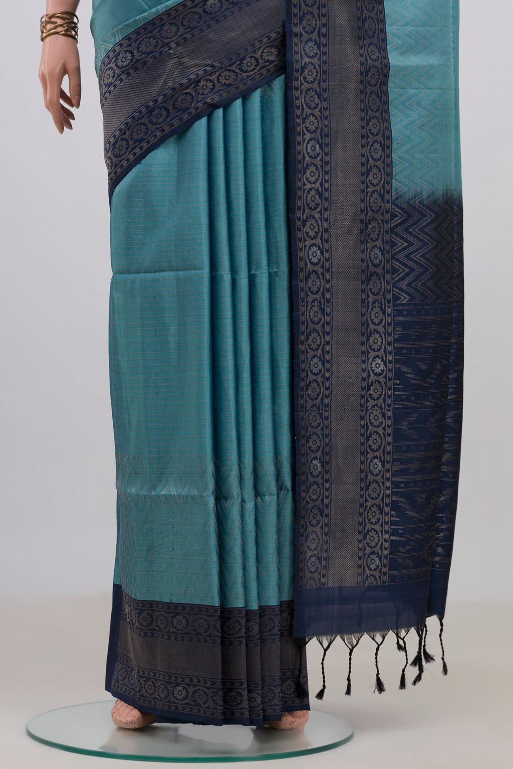 Pleats and pallu of Pure Silk Light Blue Soft Saree with Zari Brocade on the body and Fancy Border. 