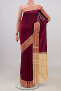 Pure Silk Maroon Narayanpet Saree with Plain Body and Zari Border.  displayed on a mannequin