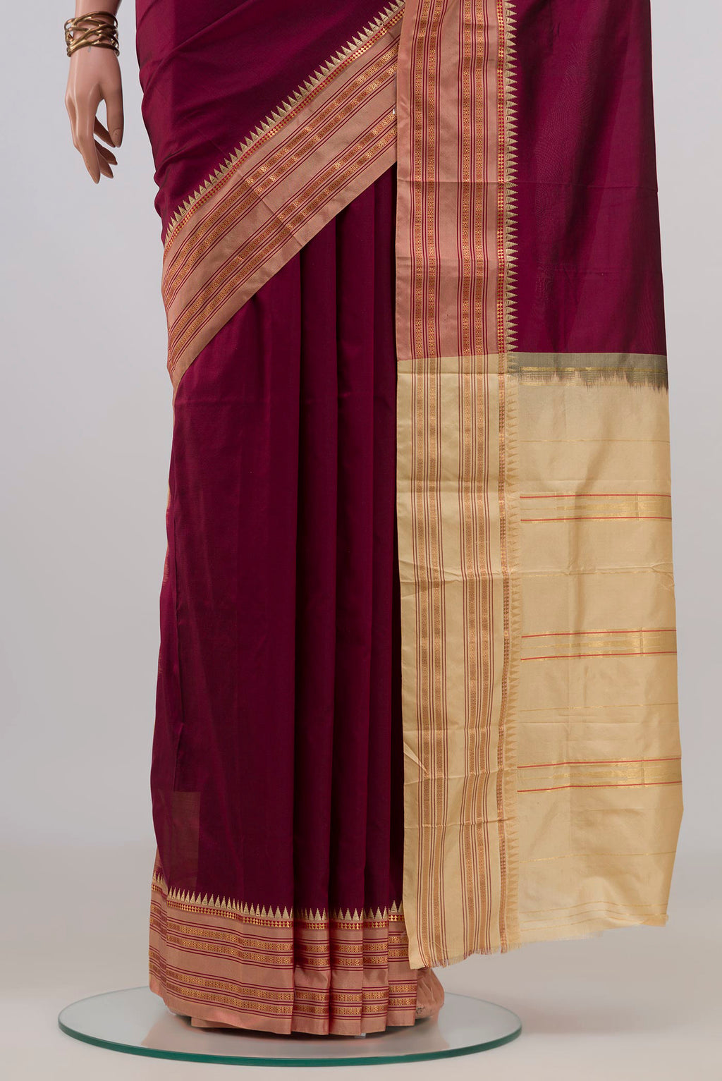 Pleats and pallu of Pure Silk Maroon Narayanpet Saree with Plain Body and Zari Border. 