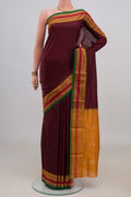 Pure Silk Maroon Narayanpet Saree with Plain Body and Zari Border.  displayed on a mannequin