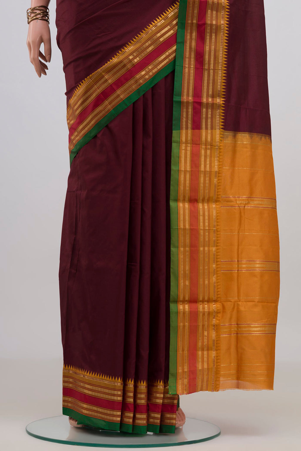 Pleats and pallu of Pure Silk Maroon Narayanpet Saree with Plain Body and Zari Border. 