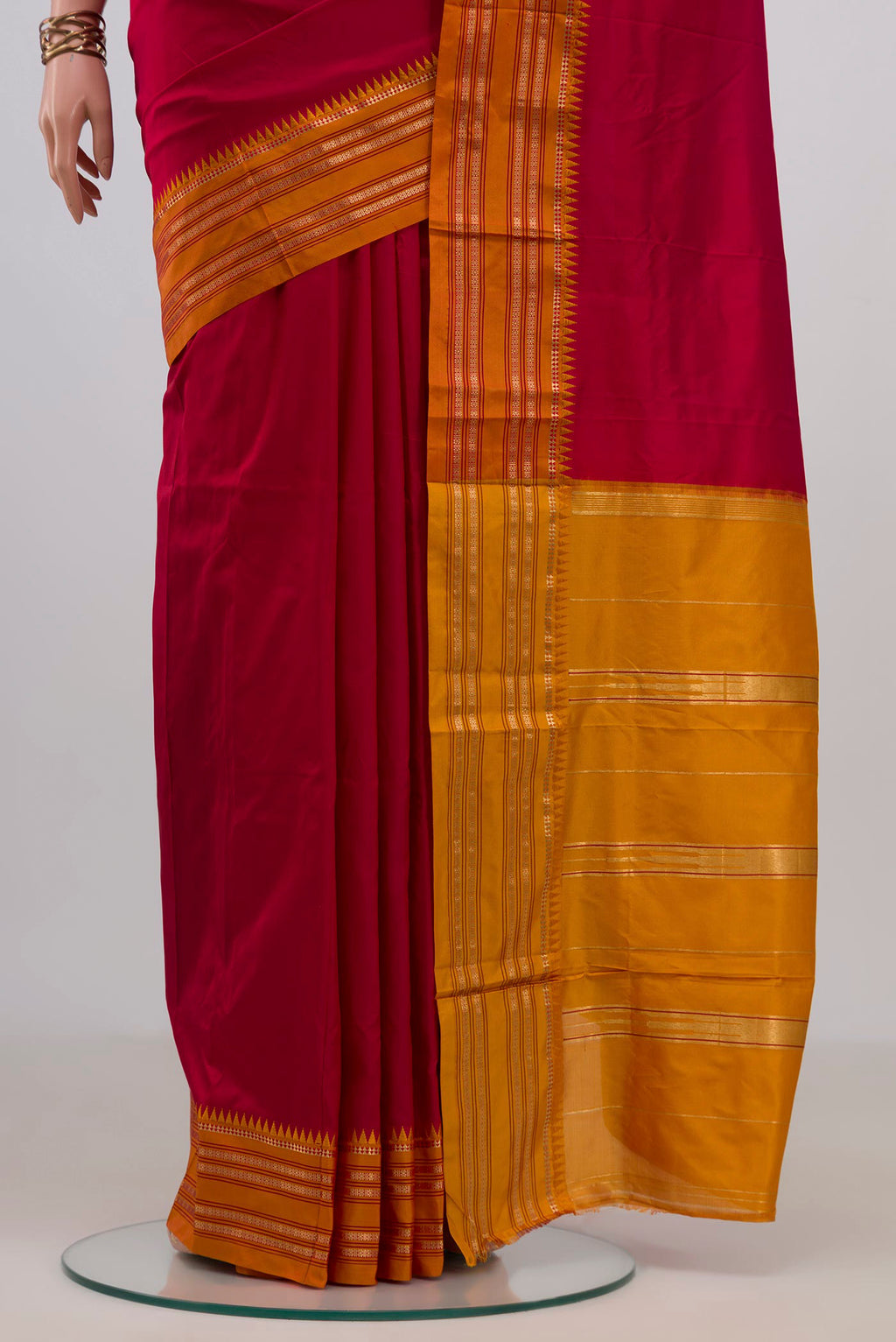 Pleats and pallu of Pure Silk Red Narayanpet Saree with Plain Body and Zari Border. 