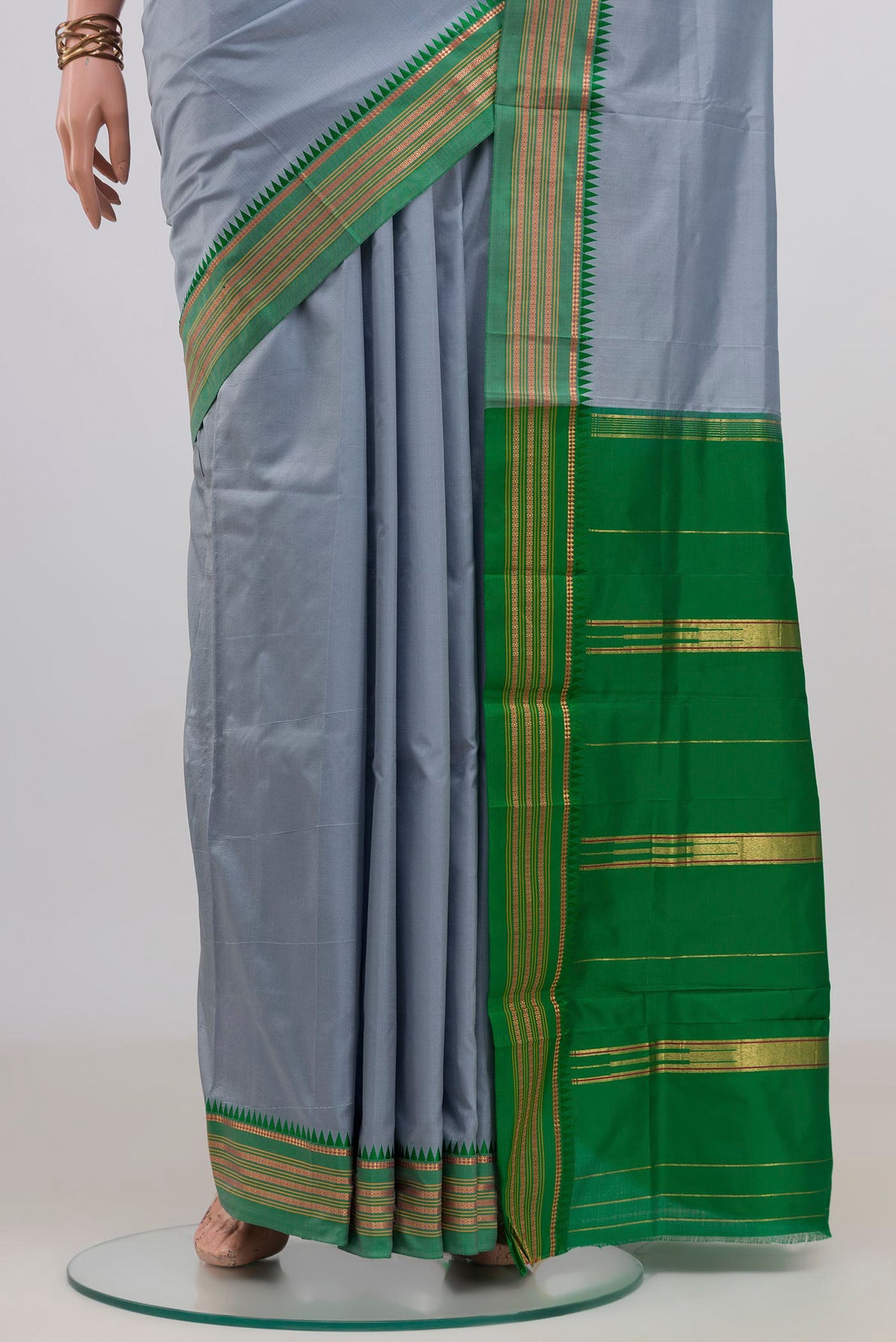 Pleats and pallu of Pure Silk Grey Narayanpet Saree with Plain Body and Zari Border. 