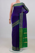 Pure Silk Dark Blue Narayanpet Saree with Checked design on the body and Zari Border.  displayed on a mannequin