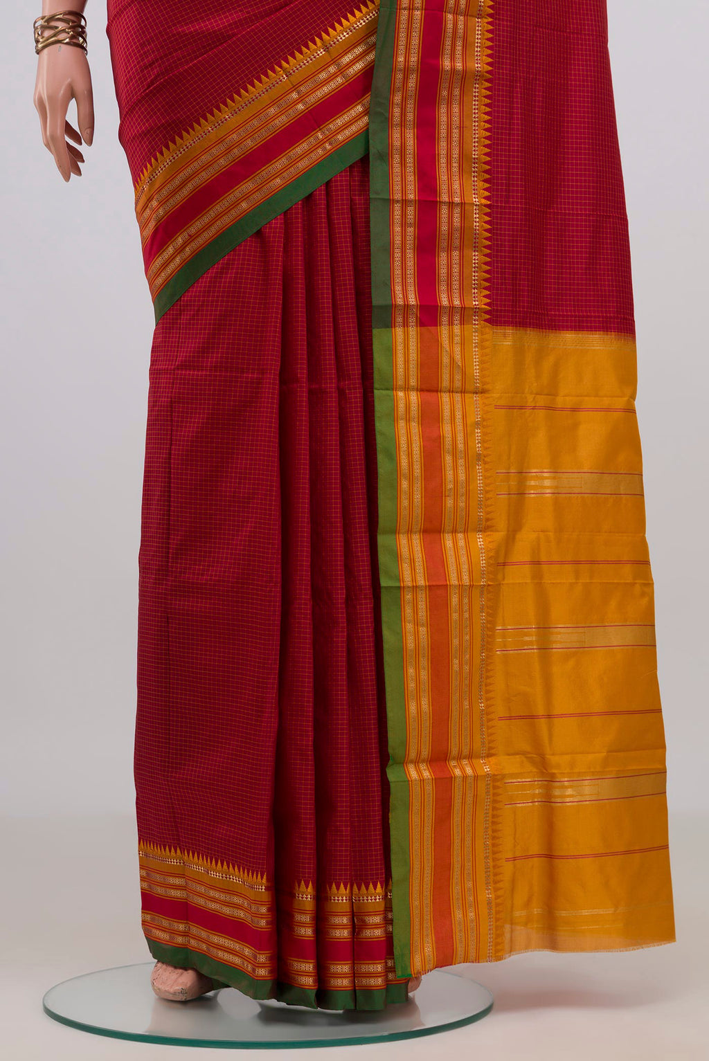 Pleats and pallu of Pure Silk Red Narayanpet Saree with Checked design on the body and Zari Border. 
