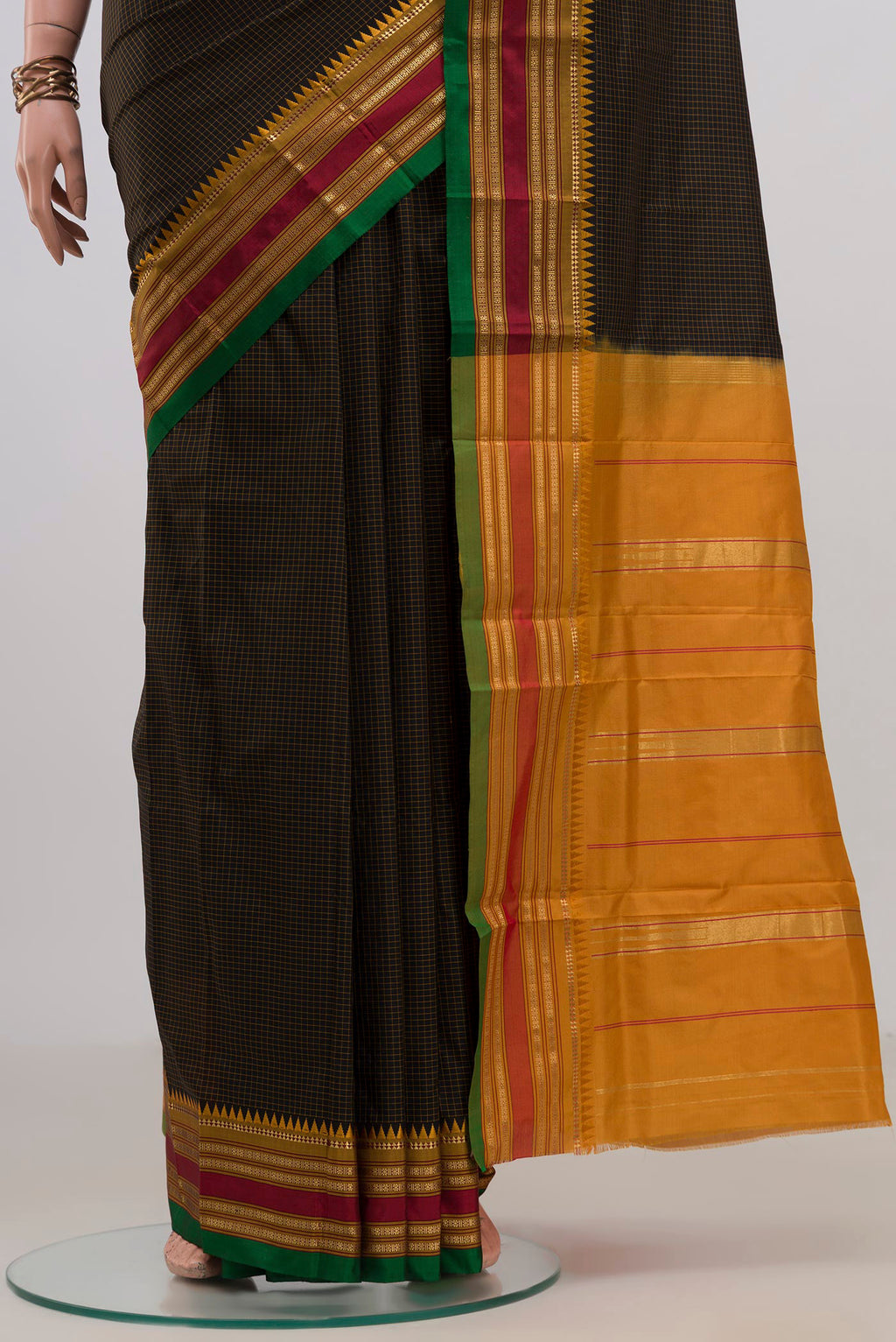 Pleats and pallu of Pure Silk Black Narayanpet Saree with Checked design on the body and Zari Border. 