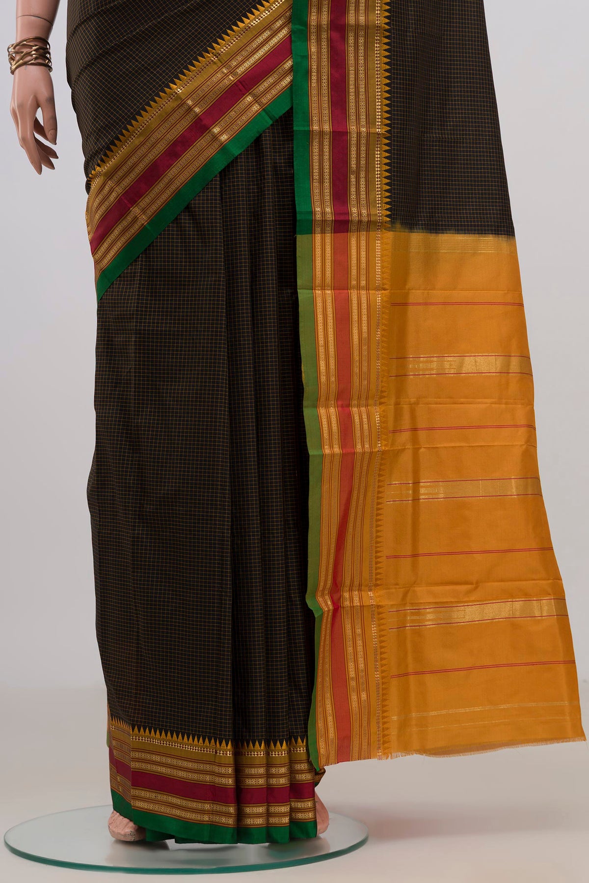 Pleats and pallu of Pure Silk Black Narayanpet Saree with Checked design on the body and Zari Border. 
