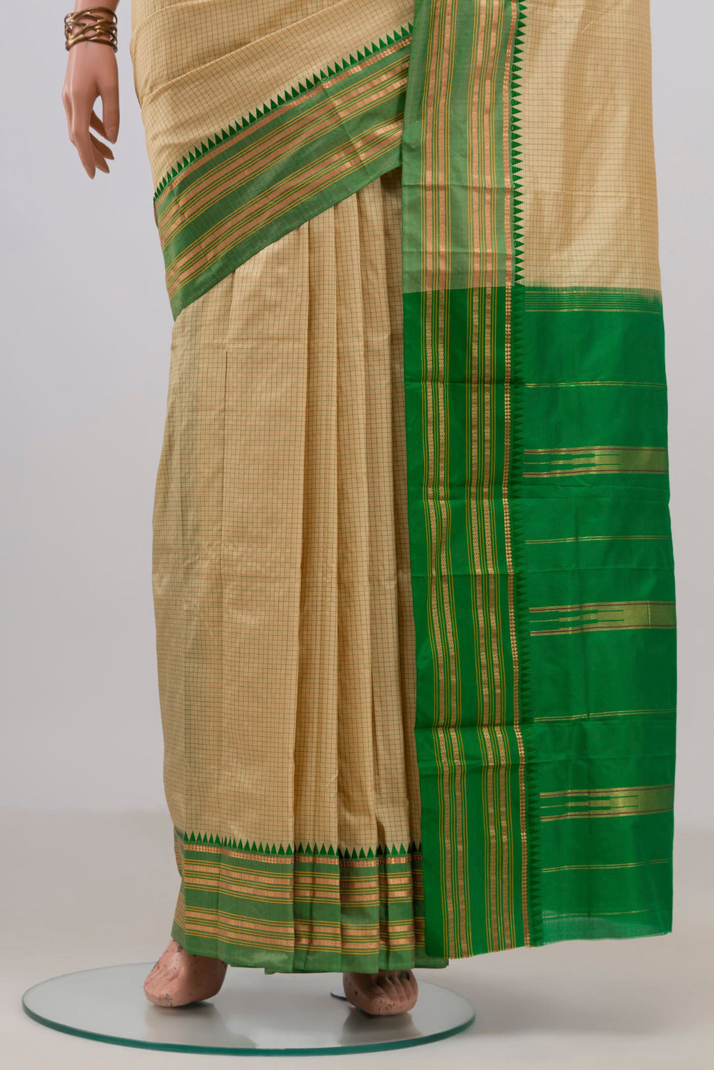 Pleats and pallu of Pure Silk Cream Narayanpet Saree with Checked design on the body and Zari Border. 