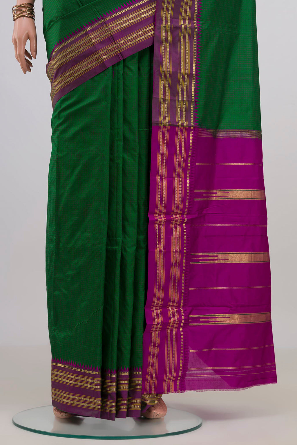 Pleats and pallu of Pure Silk Green Narayanpet Saree with Checked design on the body and Zari Border. 