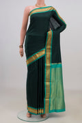 Pure Silk Black Narayanpet Saree with Checked design on the body and Zari Border.  displayed on a mannequin